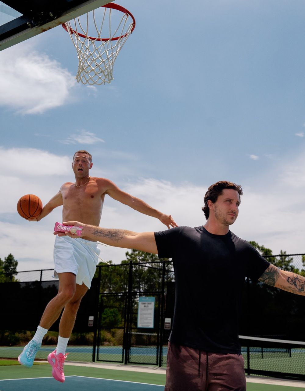 Kurt Benkert dunking on an outdoor court during the More shoot.